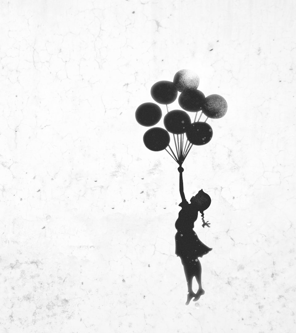 Concrete wall with Banksy painting of girl with balloons floating away