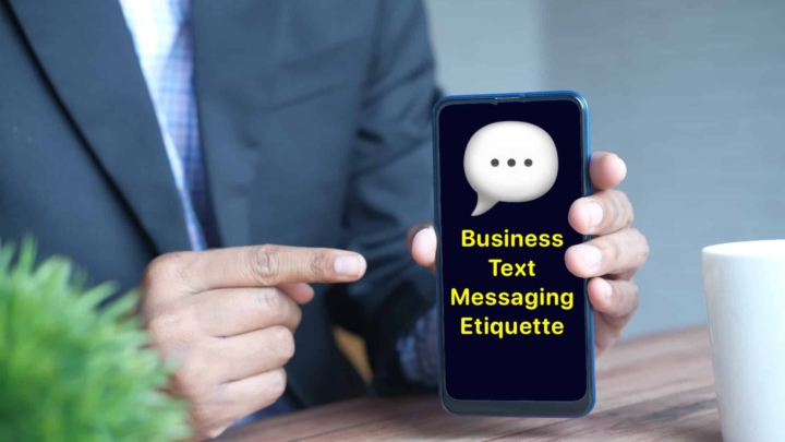 Businessamn with smartphone with text 