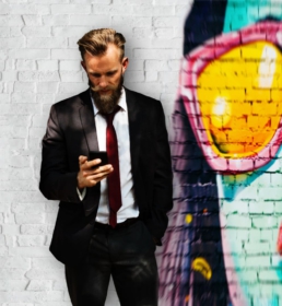 Man on phone with mobile app for business talk & text